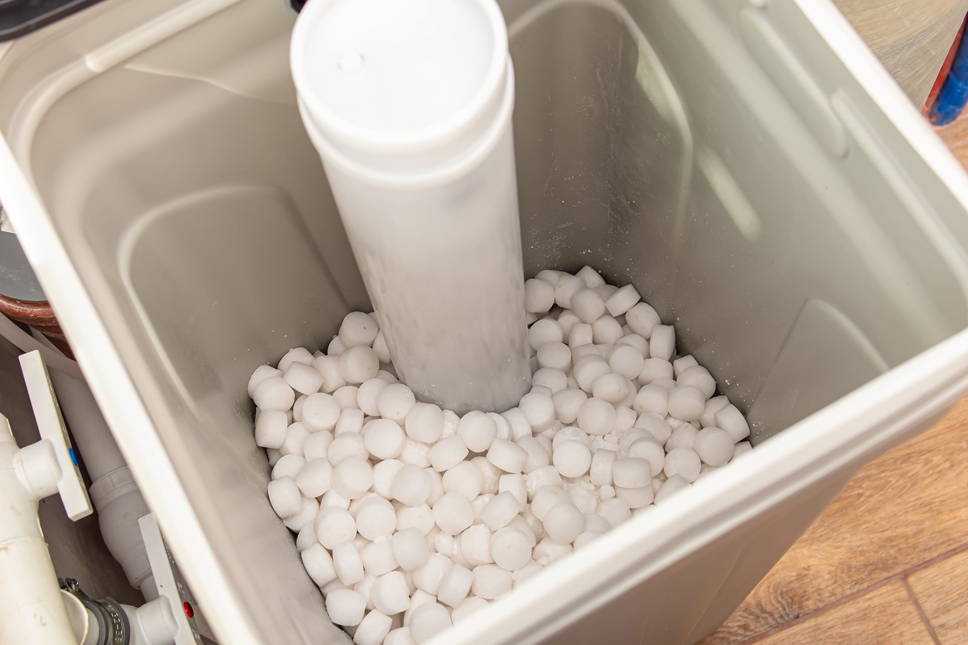 Salt pellets in water softener container