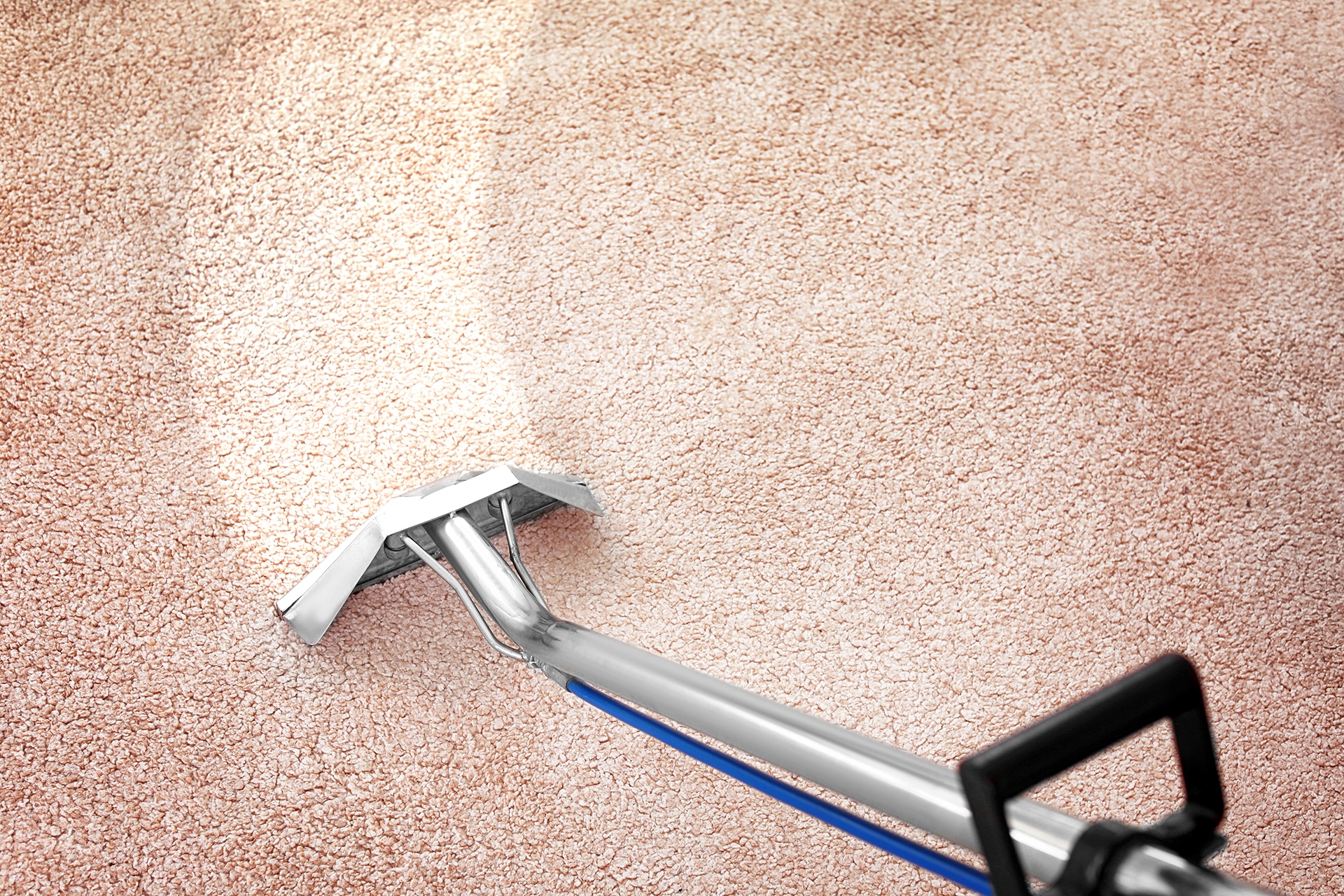 Carpet cleaning with a vacuum cleaner wand